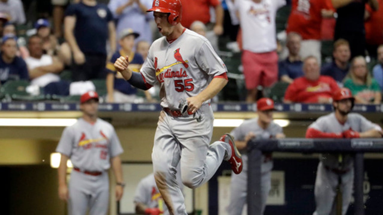 Late throwing error lifts Cardinals to 6-5 win over Brewers